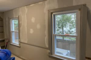 Tape and mud on a dining room wall