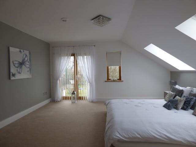 Bedroom with freshly painted walls by Crocker Home Painting in Avon, Ohio