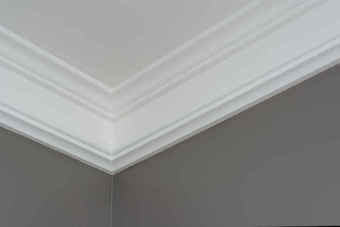 Elegant crown molding installation in a living room