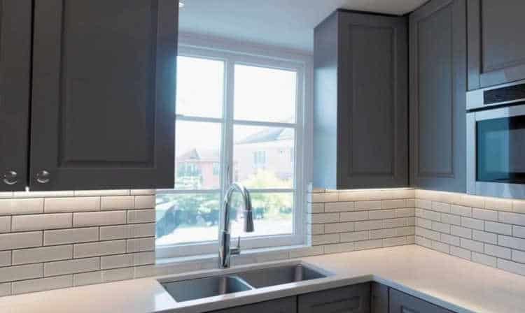 Stylish subway tile backsplash in a contemporary kitchen.