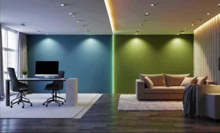 Multi-functional room with dynamic color zoning for work and relaxation areas.