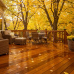 Refinished wood deck in Ohio with fresh stain and sealer reflecting fall colors and long-lasting outdoor protection.