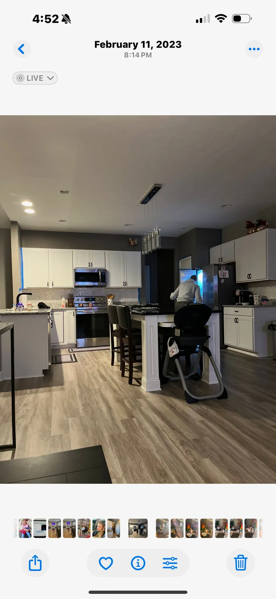 Kitchen cabinets masked and prepped for painting by Crocker Home Painting in Westlake, Ohio